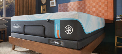 TEMPUR-LuxeBreeze Firm mattress in a styled bedroom scene