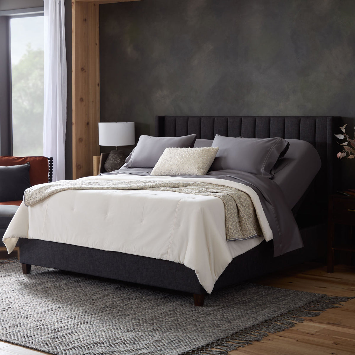 Malouf S655 split base, both heads raised with dressed bedding